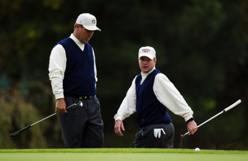 Scott Verplank and Hal Sutton of the USA eye up a putt
